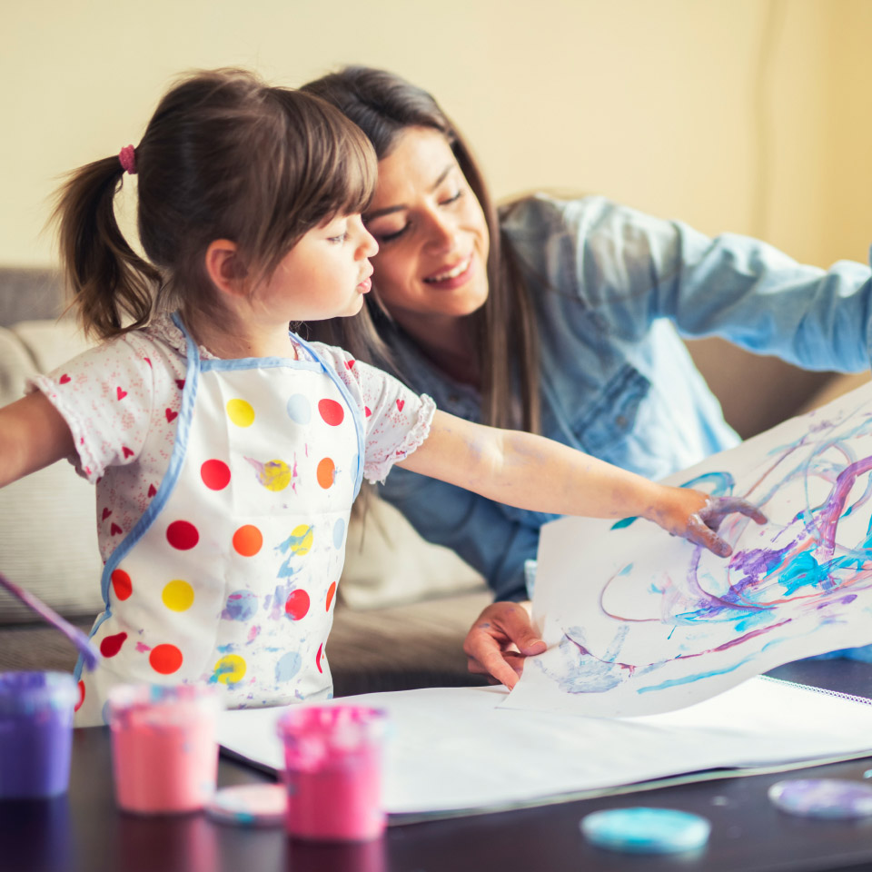 mom and daughter painting