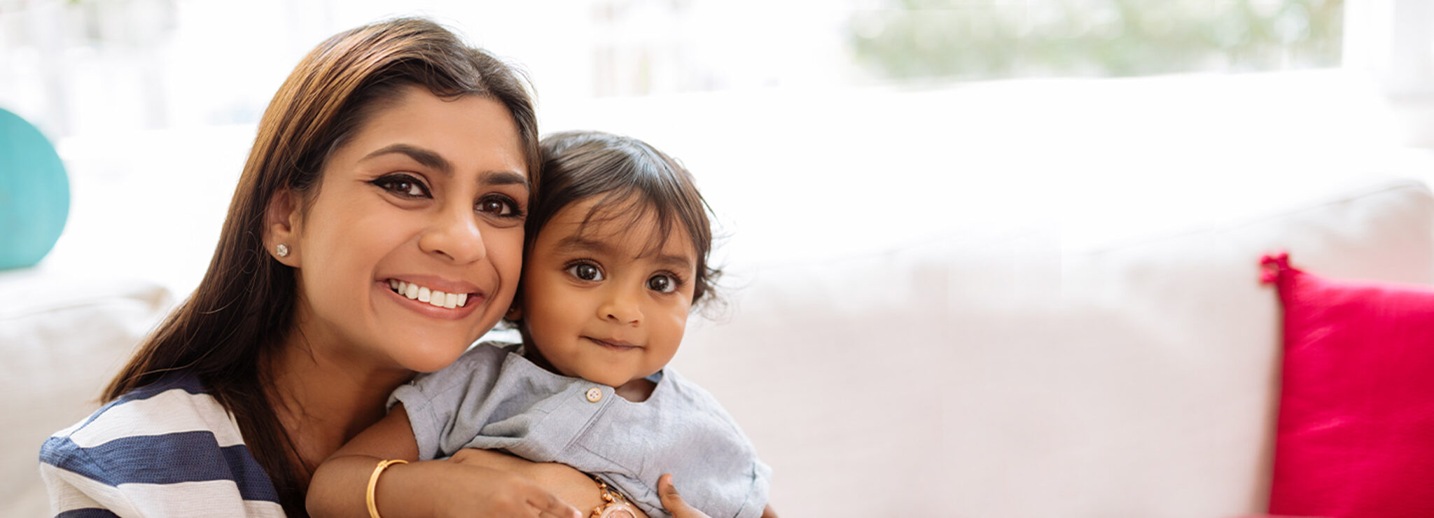 smiling mom and baby